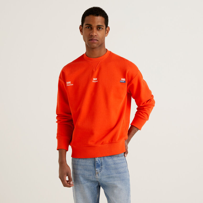 Orange sweatshirt in organic cotton