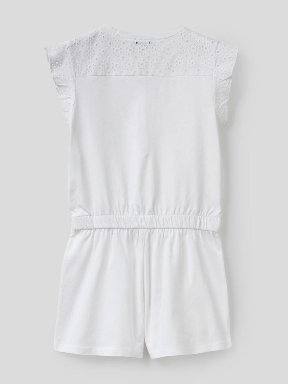 Jumpsuit with inserts in perforated fabric image number null