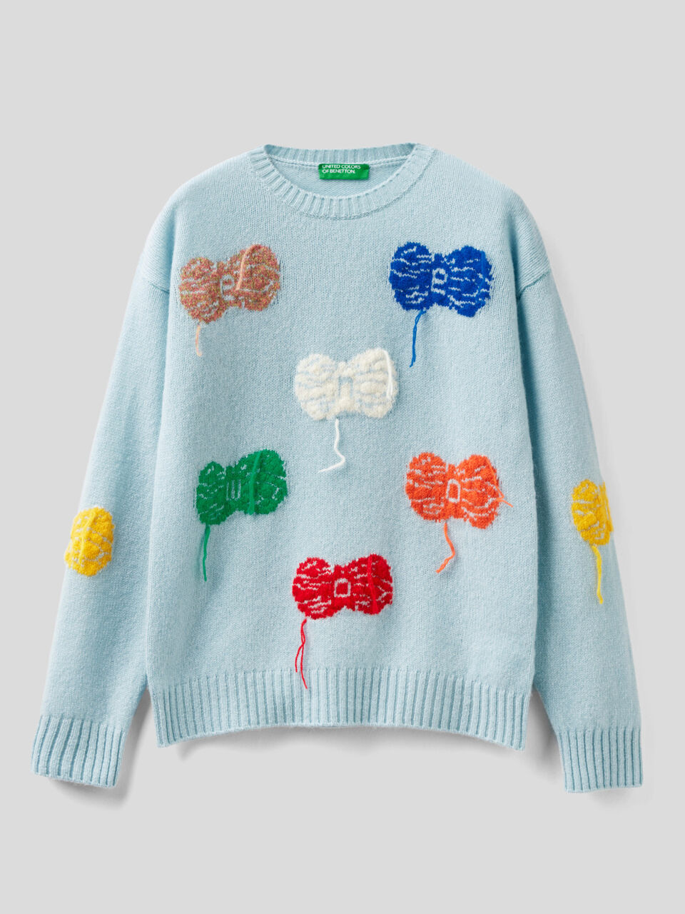 Merino wool sweater with balls of yarn image number 1