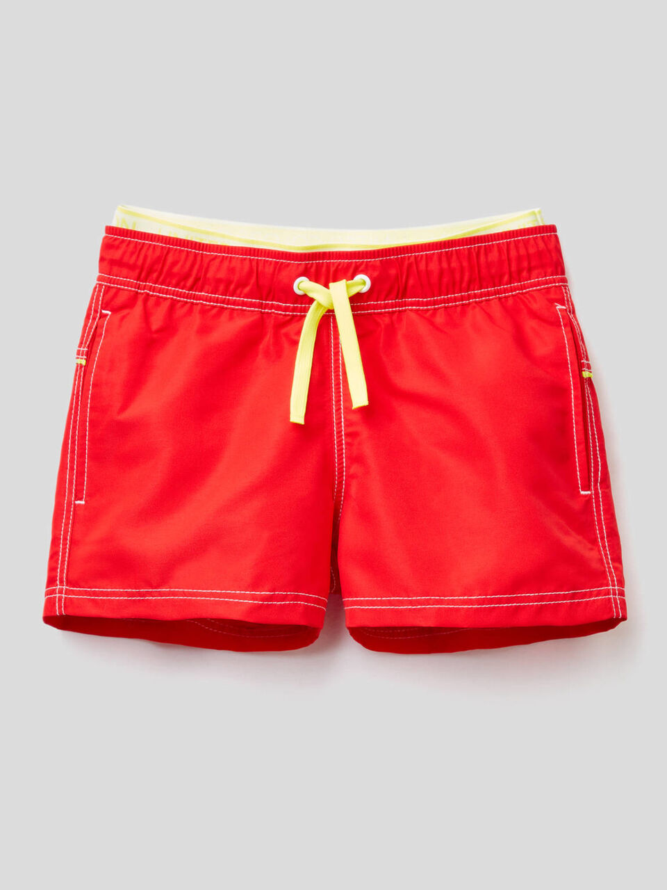 Swim trunks with neon details image number null