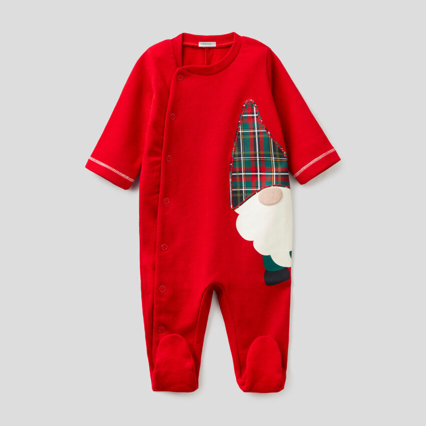 Red onesie in pure cotton with gnome print