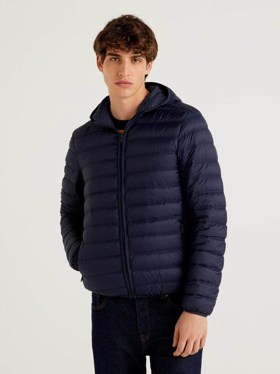 black and blue puffer jacket