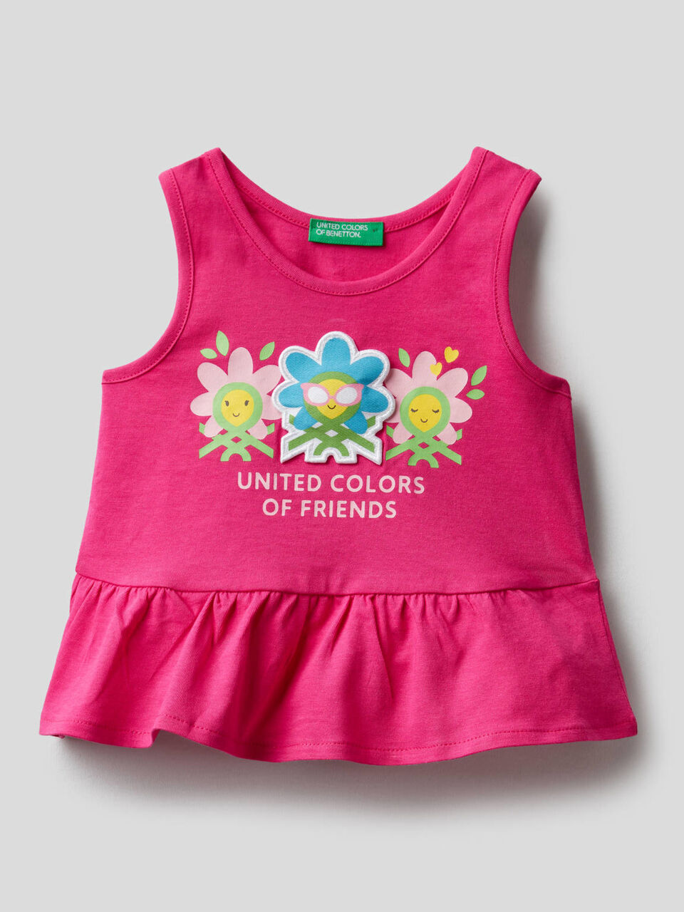 100% cotton tank top with frill on the bottom image number null