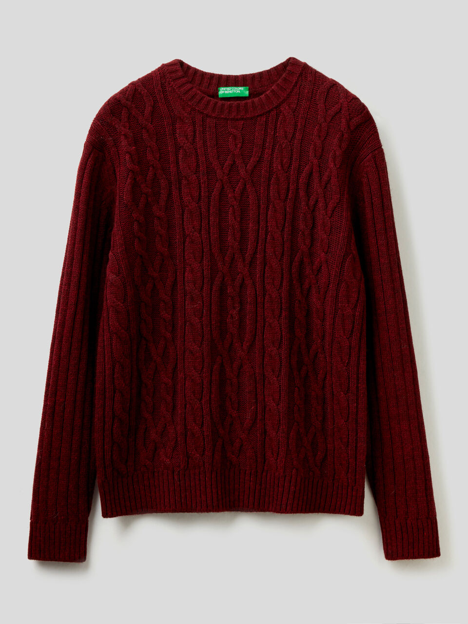 Knitted sweater with braids and ribs image number 1